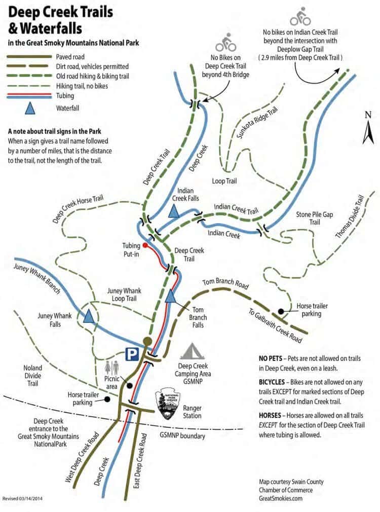 Map of Deep Creek Trails & Waterfalls in the Great Smoky Mountains National Park. Highlights include Indian Creek Trail, Juney Whank Falls, and Tom Branch Falls. Symbols show trail use for hiking, mountain biking akin to biking the Swamp Rabbit Trail with kids, and tubing. Parking areas marked.